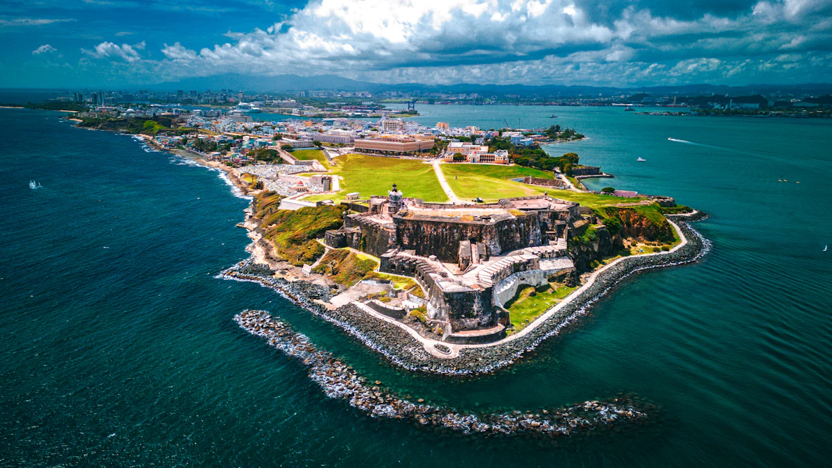 Aerial view of Castillo San Felipe del Morro and Old San Juan surrounded by blue ocean in Puerto Rico